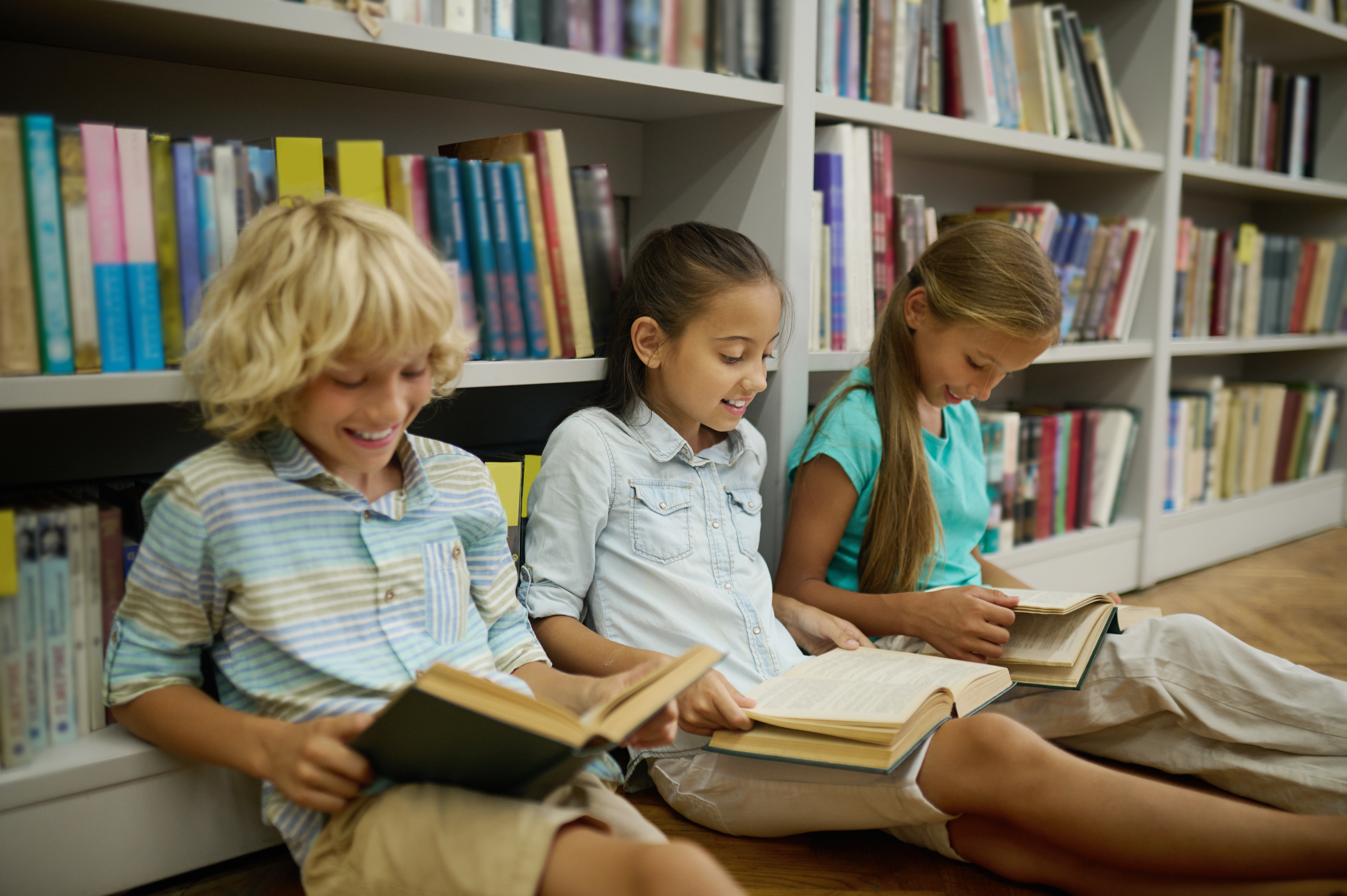 Children reading books safely